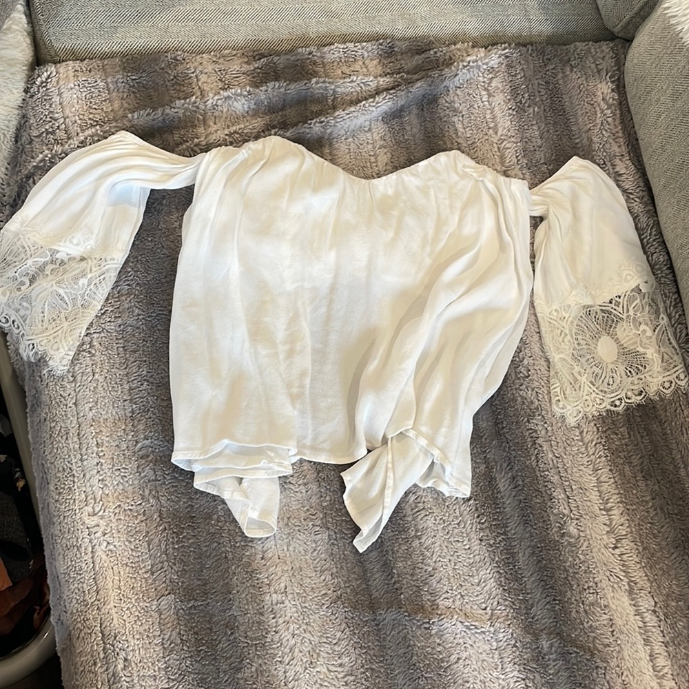 White off the shoulder evening out top. Size small. Gently used.